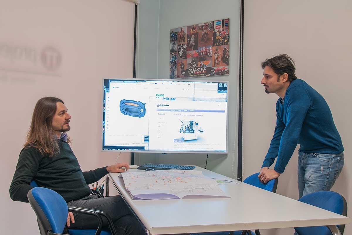 I soci Pietro Davolio e Alessandro Caltabellotta al lavoro in ufficio a Novellara